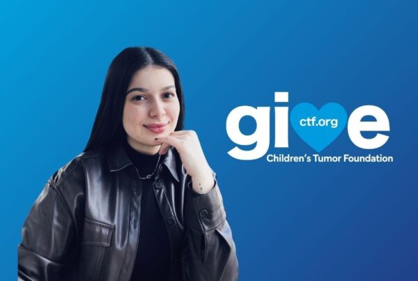 A person in a leather jacket smiles at the camera with their chin resting on their hand. The background features the Children's Tumor Foundation logo and website URL, ctf.org.