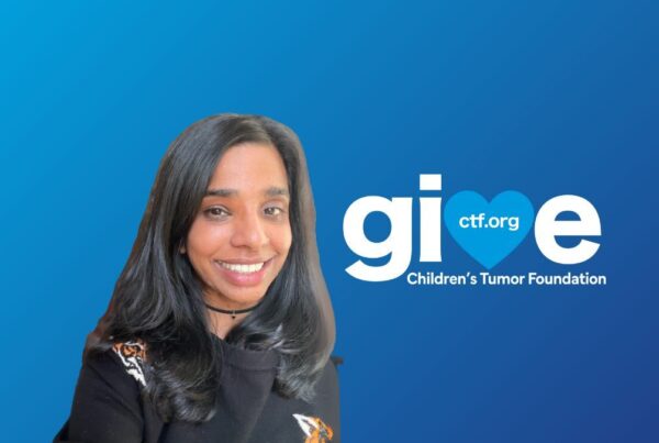 A person smiles against a blue background with the Children's Tumor Foundation logo.