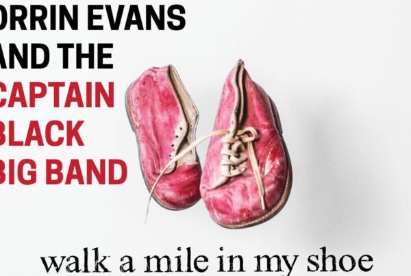 Cover art for “Walk a Mile in My Shoe” by Orrin Evans and the Captain Black Big Band, featuring a pair of worn pink shoes.