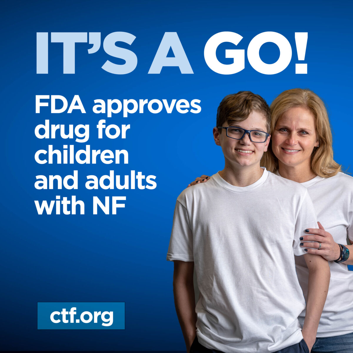 Two people smiling in front of a blue background with text: "IT'S A GO! FDA approves drug for children and adults with NF." Website link: ctf.org.