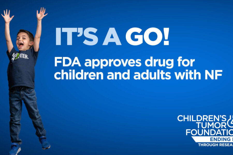 Child joyfully jumping, raising arms, wearing a "Halter" shirt on a blue background. Text: "IT'S A GO! FDA approves drug for children and adults with NF," with Children's Tumor Foundation logo.